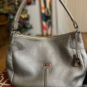 Cole Haan leather handbag-Boho style-Pewter Gold colored emblem/hardware.